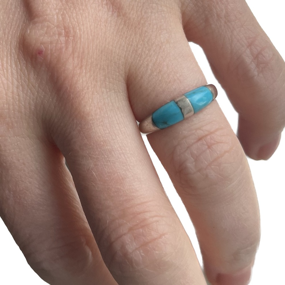 Sterling Silver Ring with Turquoise Insets.